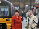David Ward and Jeanette Sunderland on platform with train in background