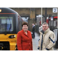 David Ward and Jeanette Sunderland on platform with train in background