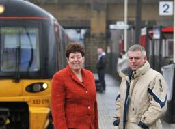 David Ward and Jeanette Sunderland on platform with train in background