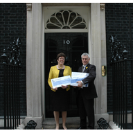 David and Jeanette present cheque petition to Downing Street