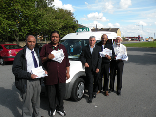 DW and Cllr Riaz Ahmed with Taxi Drivers talking about Car Insurance DW and Cllr Riaz Ahmed with Taxi Drivers talking about Car Insurance