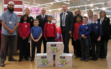 David Ward MP and the pupils with their new school equipment